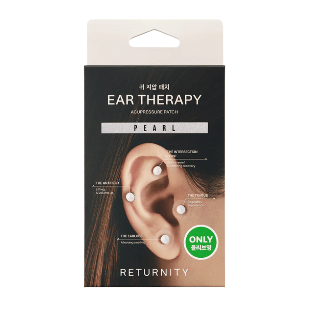 Pakkaus tuotteelle RETURNITY Ear Therapy Acupressure Patch Pearl, jossa on kuvitus korvapaikoista asetettuna korvan eri painepisteisiin.