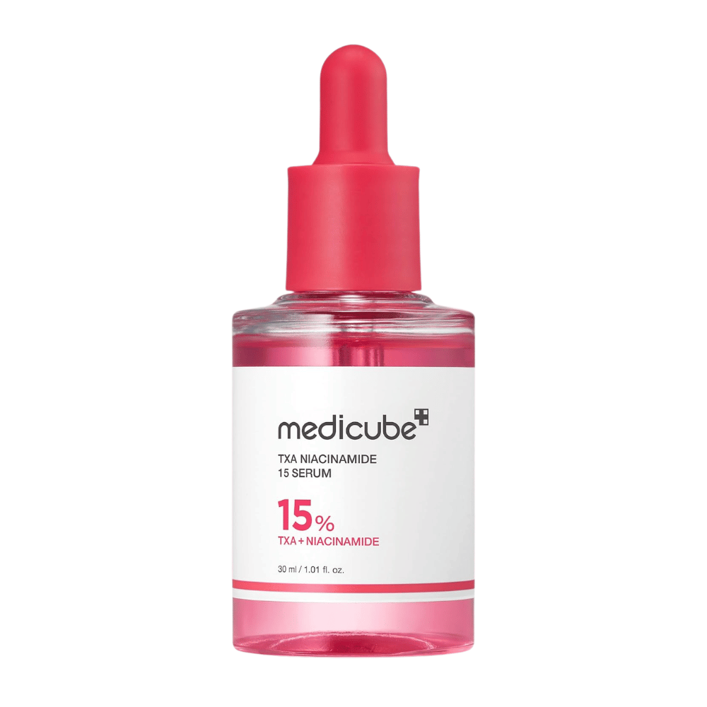 4. Medicube TXA Niacinamide 15 Serum 30 ml – vaaleanpunainen seerumipullo pipetillä valkoista taustaa vasten